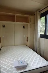 lit dans petite maison